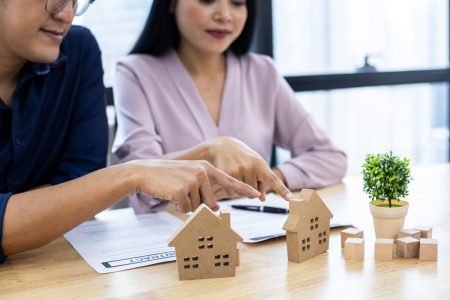 Buy home concept, husband and wife are planning to buy a house.